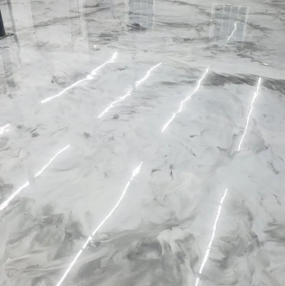 Decorative metallic epoxy floor in Colorado retail space