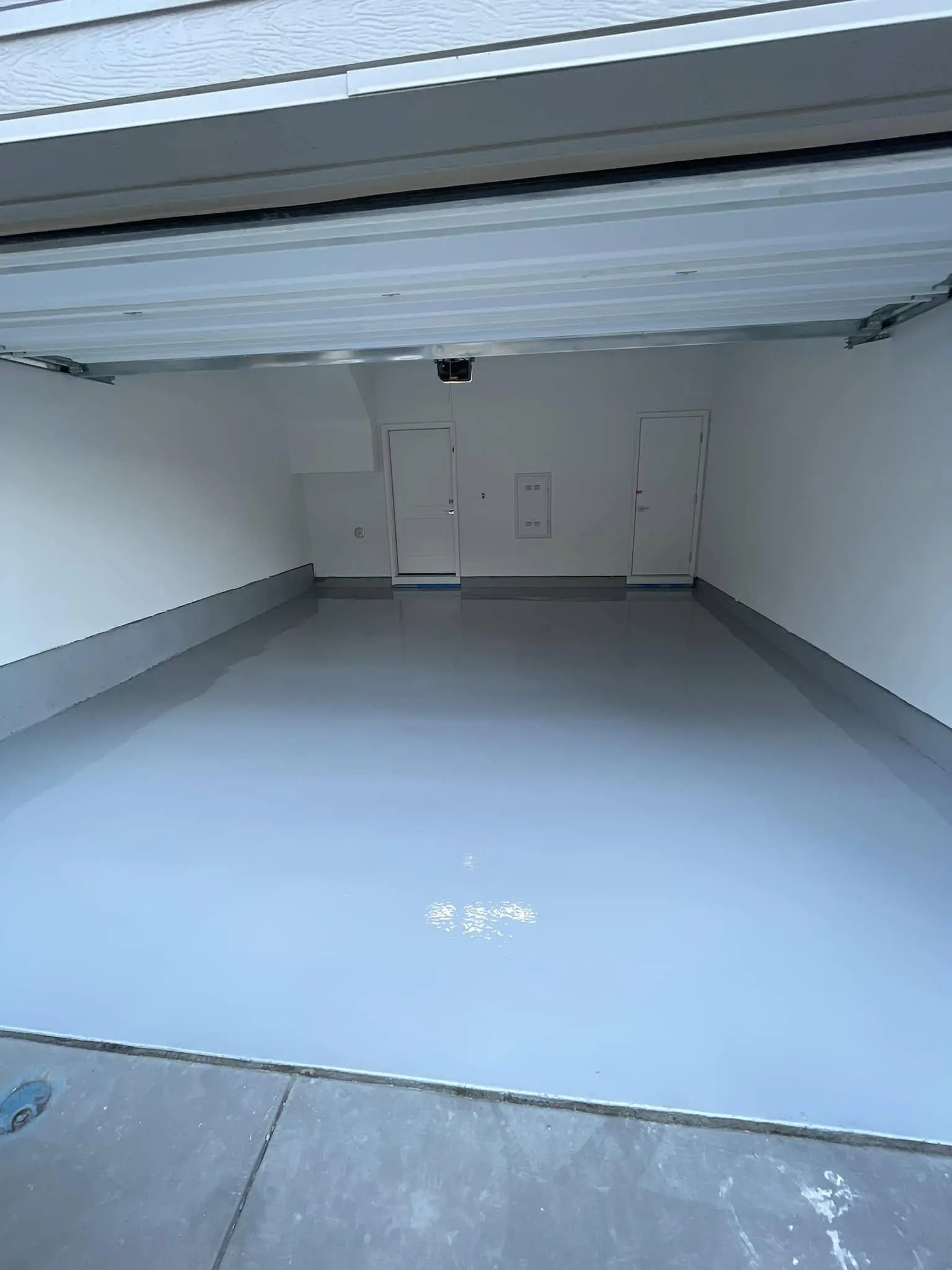 Metallic epoxy flooring installation by Elevated Epoxy Co in Denver Metro
