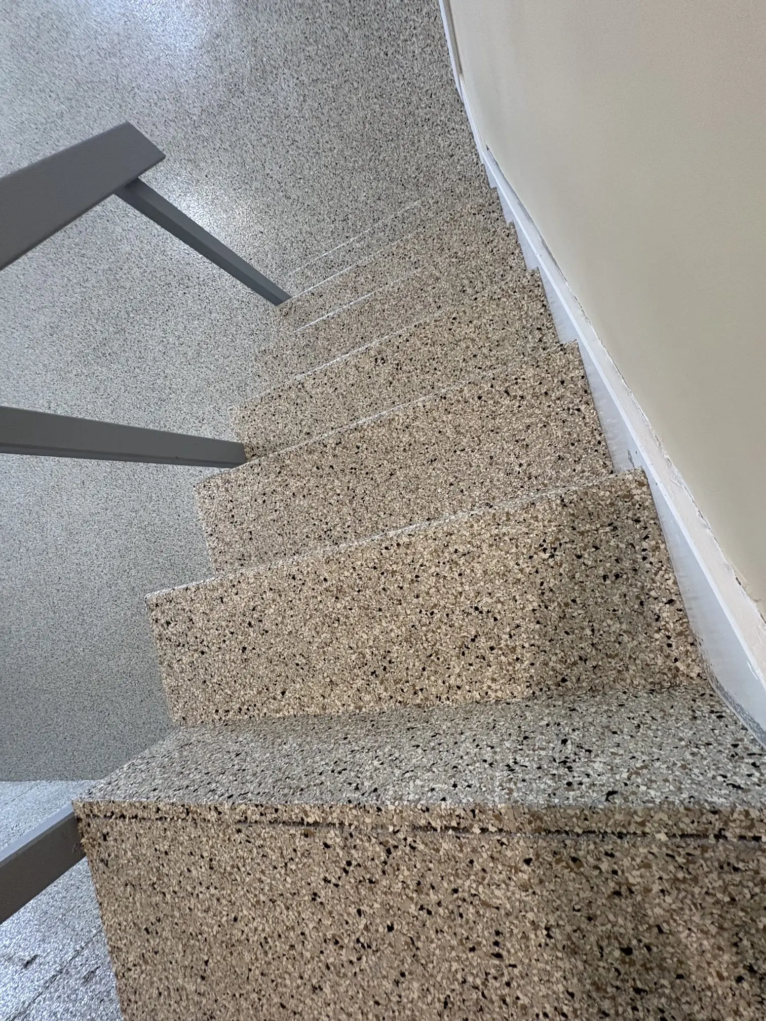 Commercial epoxy flooring installation in Aurora warehouse by Elevated Epoxy Co