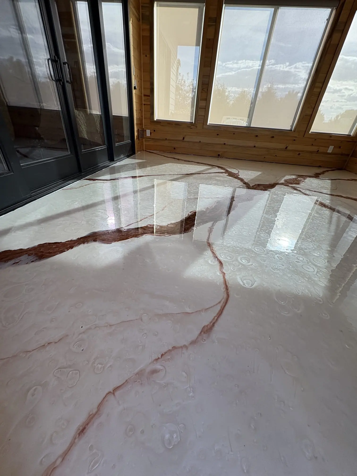 Elevated Epoxy Co team working on metallic epoxy floor in Parker, Colorado