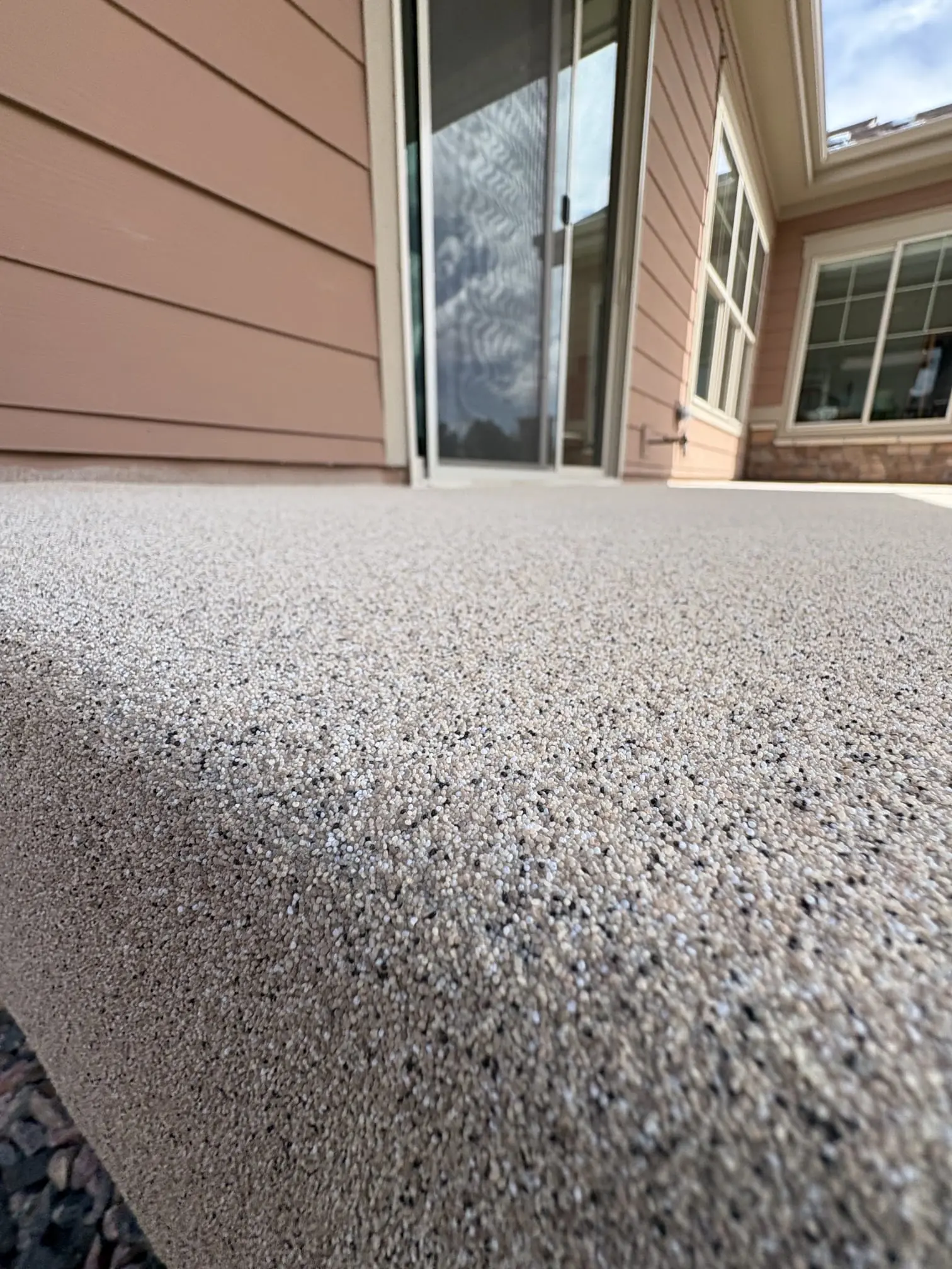 Dark flake epoxy floor in two-car residential garage, Denver Metro Colorado